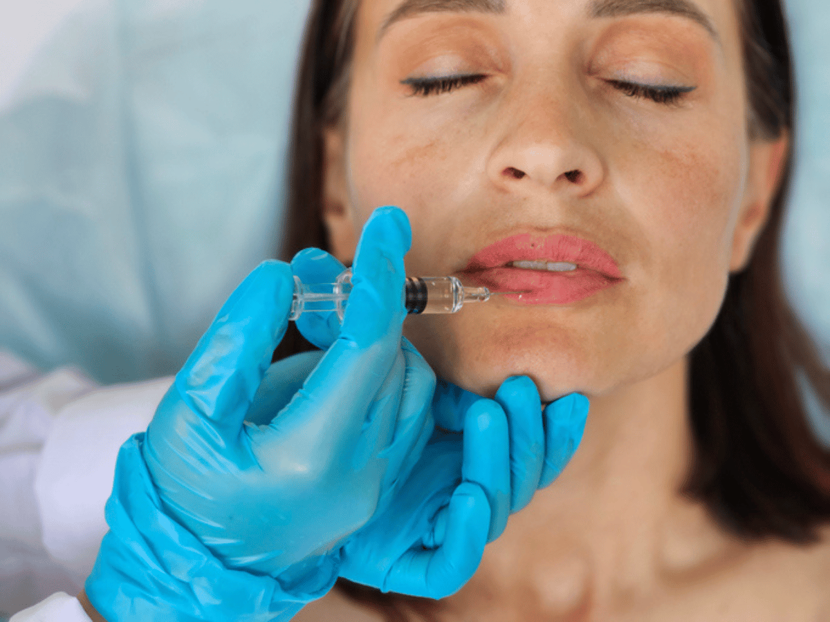 woman getting lip injections